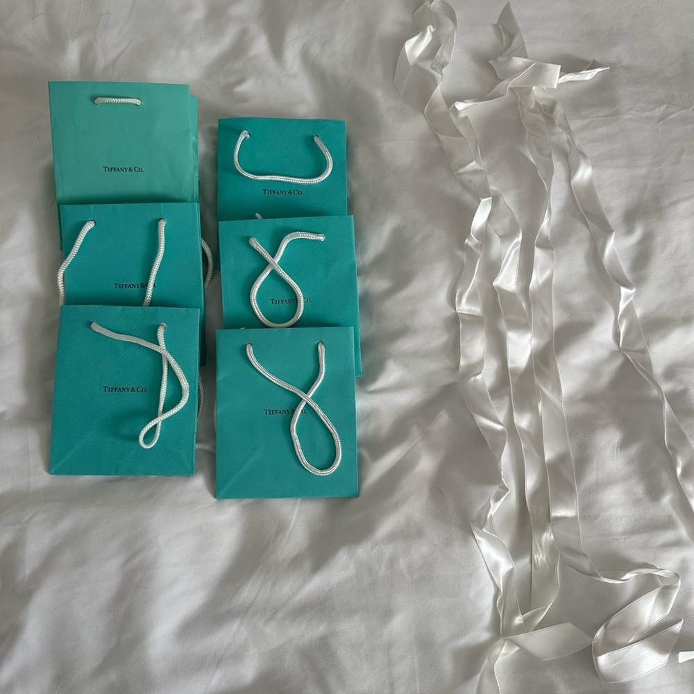 Tiffany & Co. Blue Gift Bags with White Ribbons